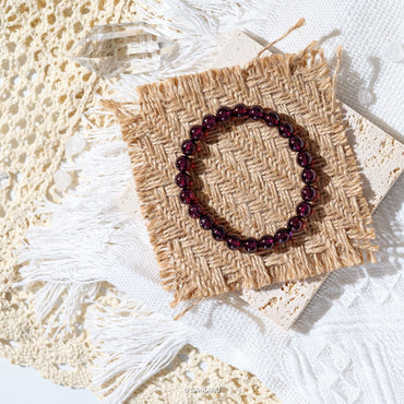 Purple tooth black garnet bracelet (reddish)