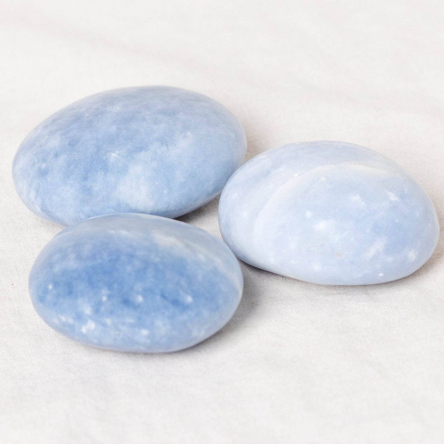 Blue Calcite Palm Stones - AAA Premium Quality